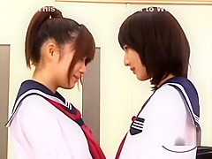 2 schoolgirls 18+ Kissing Patting While Standing In The Classroo