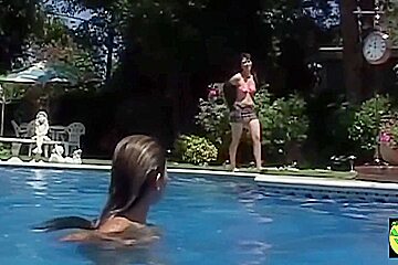 A Couple Of Funloving Asian Darlings Have Fun Getting Each Other Off Poolside