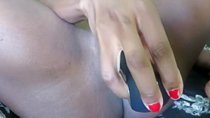 African babe masturbates and squirts