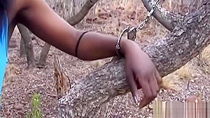 African babe tied to a tree loves to get the blowing going on