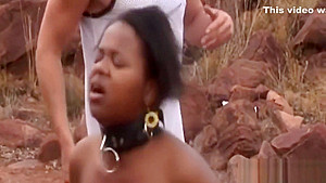 African milf outdoors by two guys