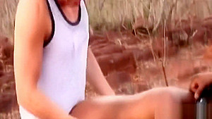 African slave takes two long schlongs outdoors