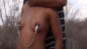 African slave takes two long schlongs outdoors