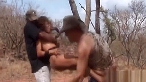 African slut with big natural tits getting spanked and tormented by two guys