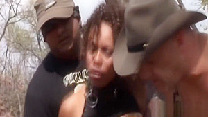 African slut with big natural tits getting spanked and tormented by two guys