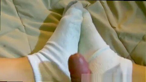 Angel grips his camera for a POV wank