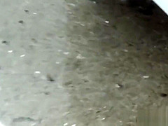 Asian whore pees behind car
