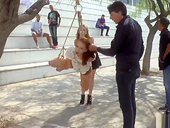 Babe whipped and caned by the lake