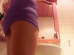 Bathroom dildo masturbing