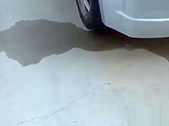 Bizarre asian whore pees in car park