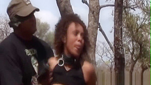 Bondage and rough outdoor spanking with an African slut
