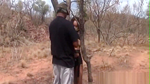 Bondage and rough outdoor spanking with an African slut
