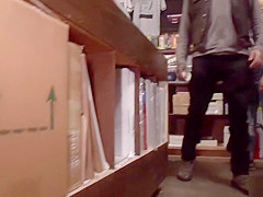 Brunette butt fingered in public shop