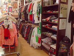 Brunette butt fingered in public shop