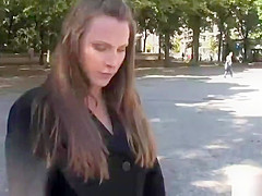 Brunette sucking outdoor in public