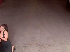 Brunette sucking outdoor in public