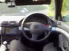 Brunette sucks fake cops dick on the public road