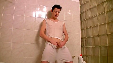 Brunette teen 18+ guy is hotly fondling dick in shower