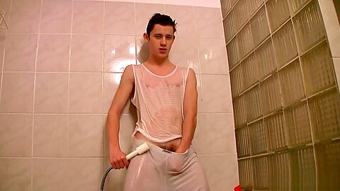 Brunette teen 18+ guy is hotly fondling dick in shower