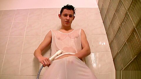 Brunette teen 18+ guy is hotly fondling dick in shower