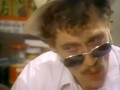 Brunette whore shows perfect tits to John Holmes