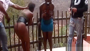 Busty African sluts bonded and outdoors