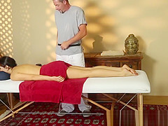 Busty beauty deepthroating her masseurs cock