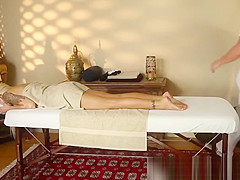 Busty inked beauty banged on massage table