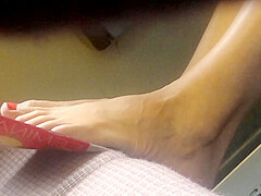 Candid feet in train - wearing shoes at end