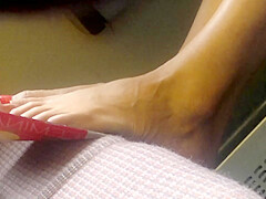 Candid feet in train - wearing shoes at end