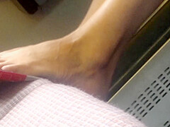Candid feet in train - wearing shoes at end