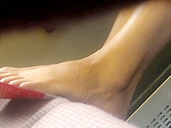 Candid feet in train - wearing shoes at end