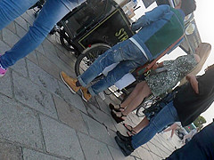 Candid young blond, sexy legs in wedges heels