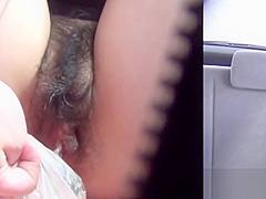 Car riding does not stop this Japanese babe from peeing