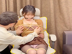 Chinese Cutie Bound On Chair