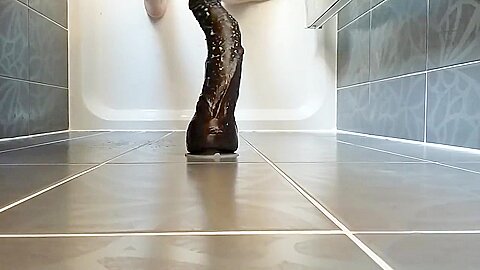 Chubby bi fucking black thunder dildo in shower