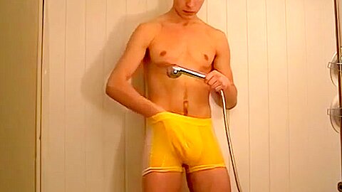 Cute twink King showers after urinating all over himself