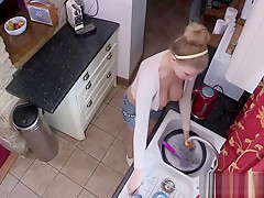 Danielle's Boobs Peek Out While Cleaning Up