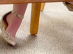 Feet soles arches of unaware worker
