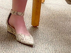 Feet soles arches of unaware worker