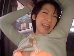 Fiery JApanese AV model fucked hard with a dildo in the back of a car