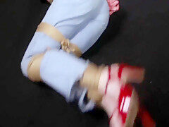 Helplessly In Tight Ropes