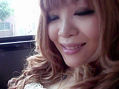 Horny cutie masturbates in the back seat of a car
