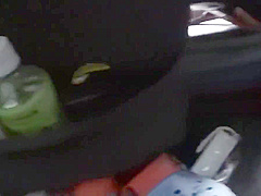 Horny cutie masturbates in the back seat of a car