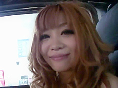 Horny cutie masturbates in the back seat of a car