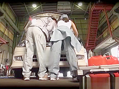 Horny garage workers fuck in the car they are fixing