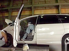 Horny garage workers fuck in the car they are fixing