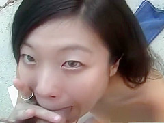 Hot Chinese babe giving a hot blowjob