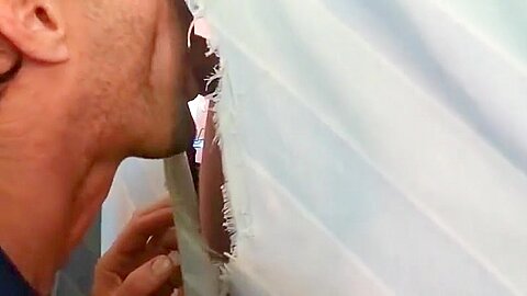 Hot sucking action at the homemade glory hole 12