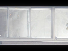 Manhattan Changing in Window